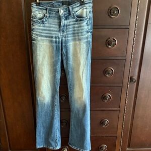 Buckle Flare Jeans in Faded Blue